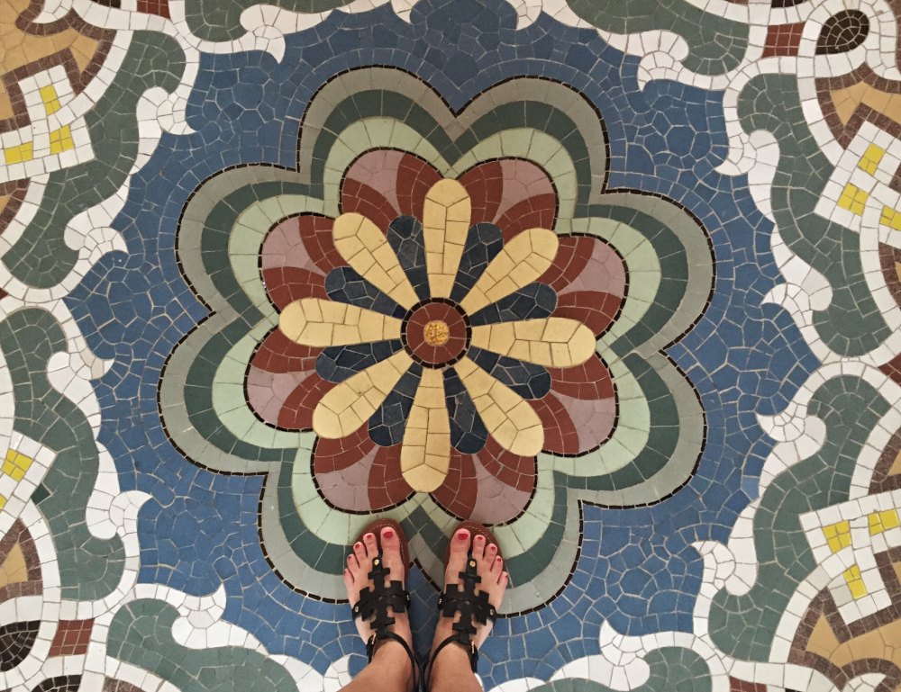 Influencer Courtney Brandt from A to Za'atar standing on mosaic floor